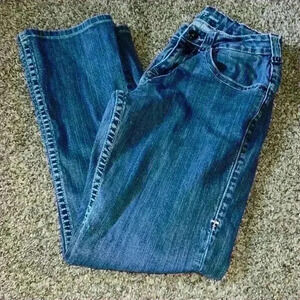 Cowgirl Tuff Bootcut jeans with pink stitching